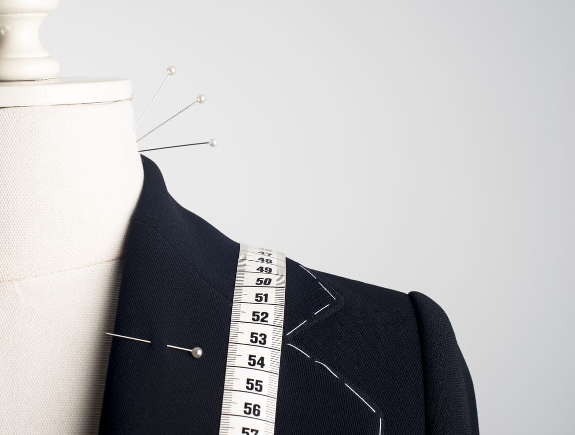 Tailor mannequin on white background.