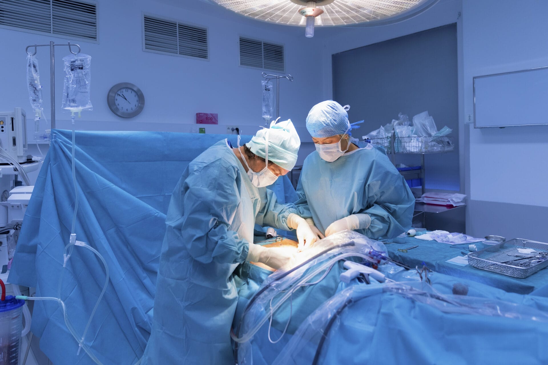 Surgeons performing surgery in operating Theater.